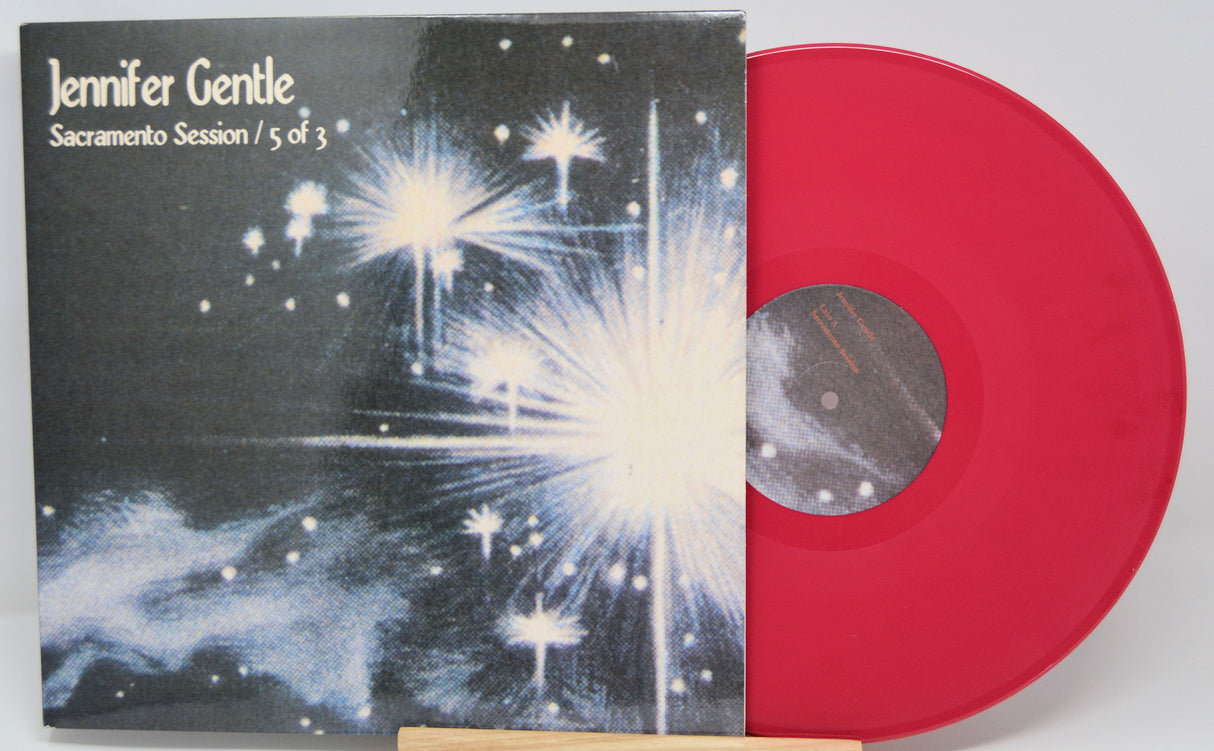 Front cover of Jennifer Gentle - Sacramento Session / 5 of 3 with red vinyl and cosmic starburst graphic