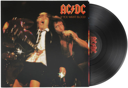 AC/DC - If You Want Blood vinyl record with album cover featuring the band members performing.