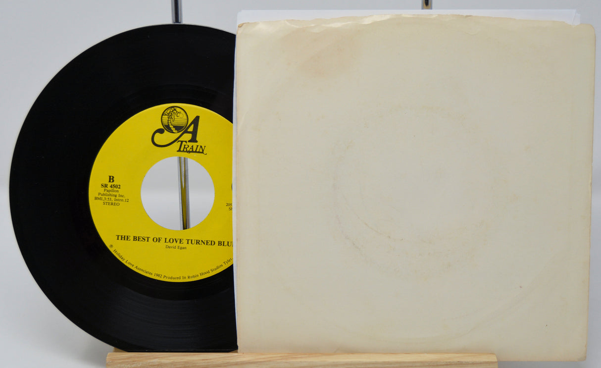 Vinyl record and cover on a white background