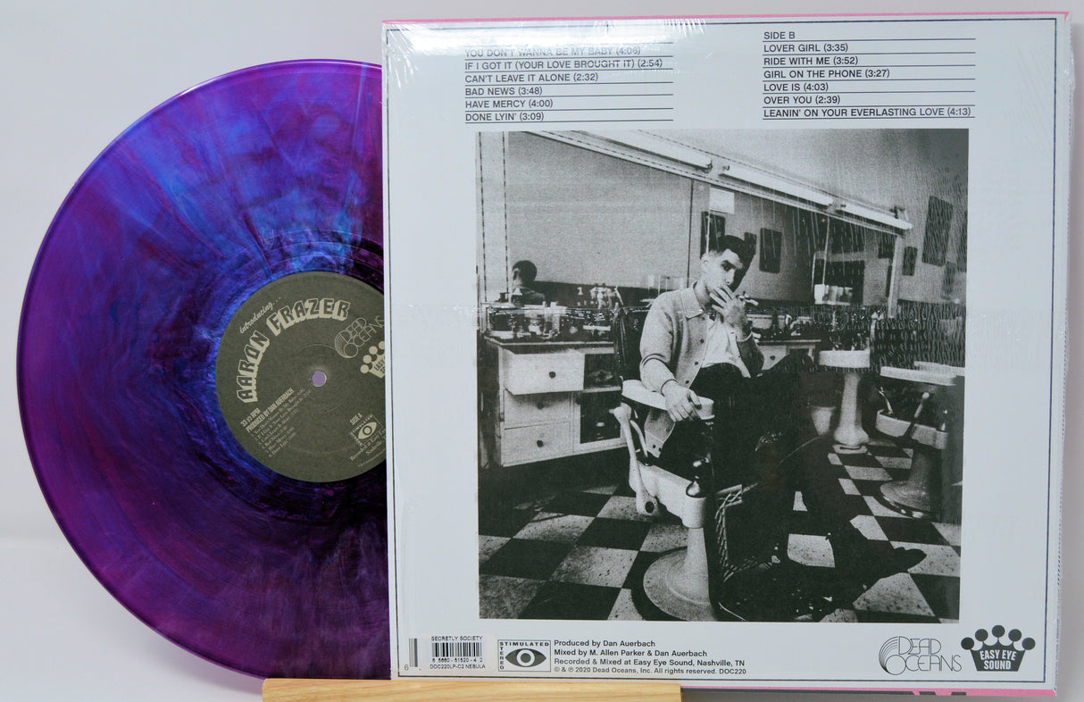 Back cover of Aaron Frazer Introducing... vinyl LP showing tracklist, black and white photo, and purple swirl record