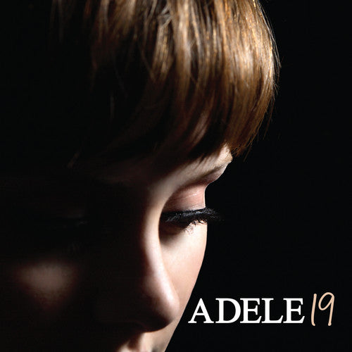 Album cover for 'Adele 19' with a close-up of a person's face and the album title.