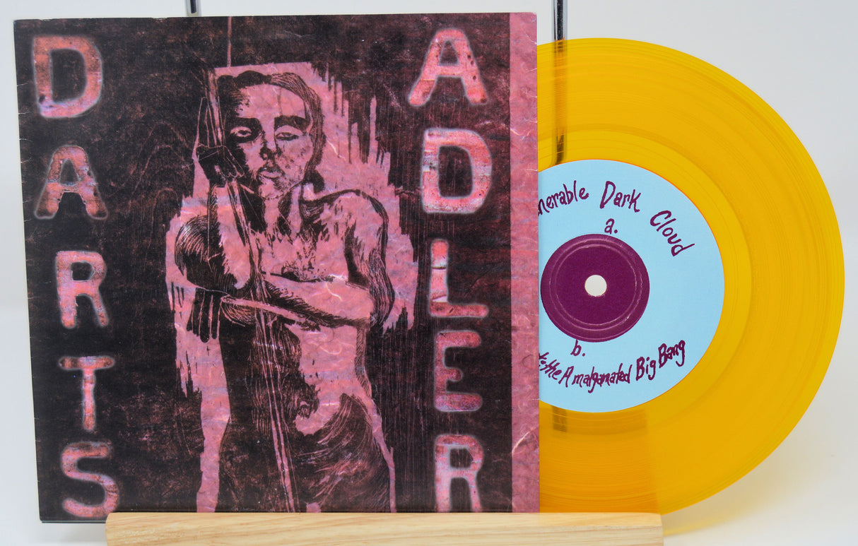 Vinyl record with yellow disc and cover featuring a stylized illustration.