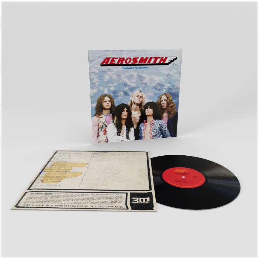 Vinyl record with Aerosmith album cover and liner notes on a white background
