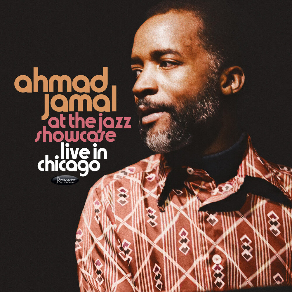 Album cover featuring a man with text 'ahmad jamal at the jazz showcase live in chicago' on a dark background.