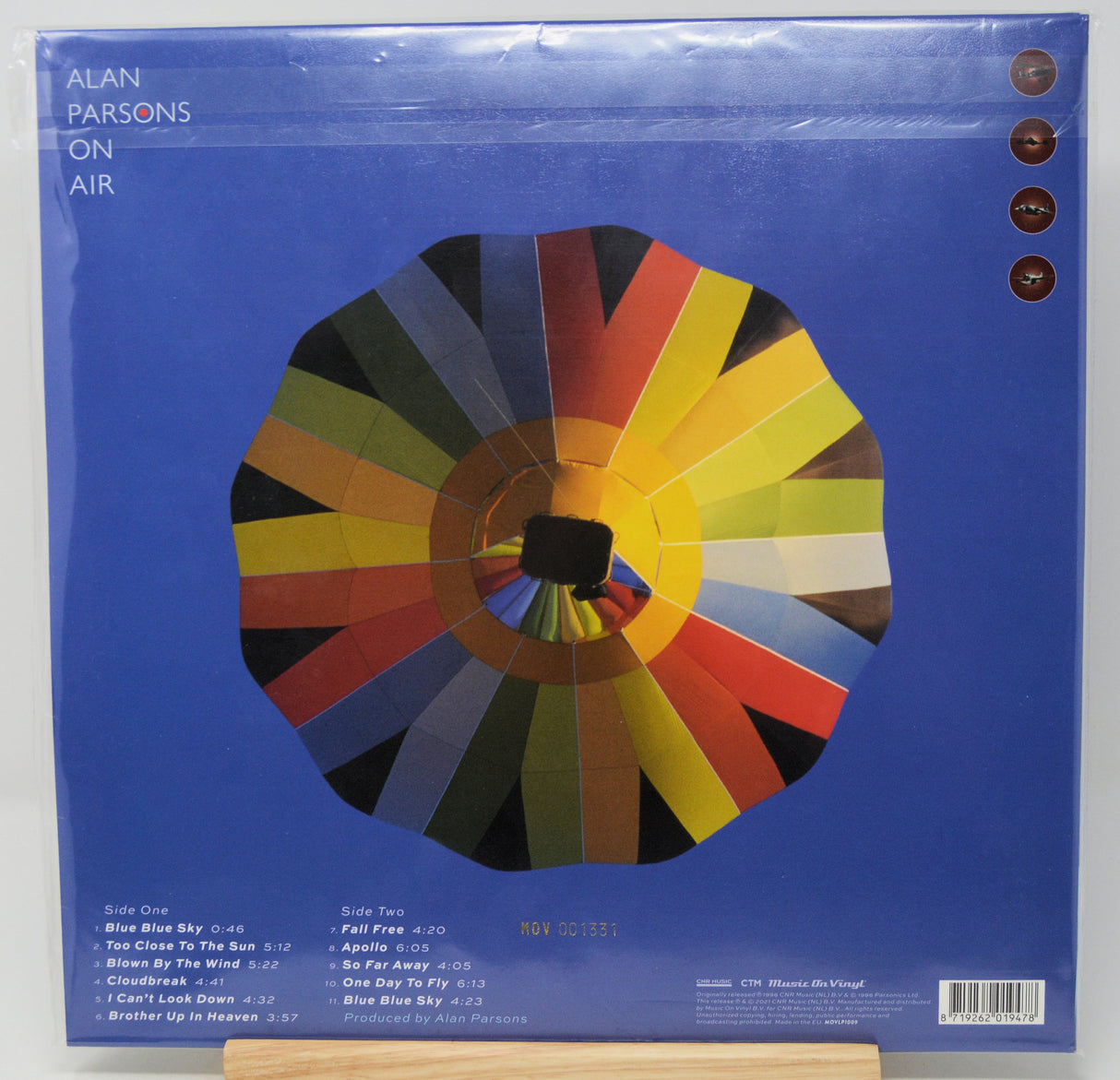 Alan Parsons 'On Air' vinyl record LP cover art, showing the back of the blue sleeve with a large circular multicolor graphic and tracklist details.