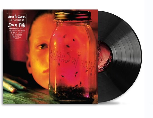 Album cover of Alice In Chains - Jar Of Flies featuring a glass jar with insects inside and a child's face in the background.