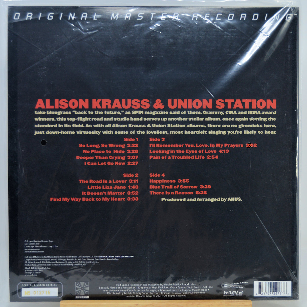 The back cover of the Alison Krauss & Union Station 'Original Master Recording' vinyl LP sleeve, showing track listings, credits on a black background.
