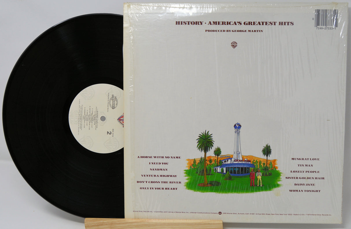 Vinyl record with cover featuring a scenic illustration and text on a white background