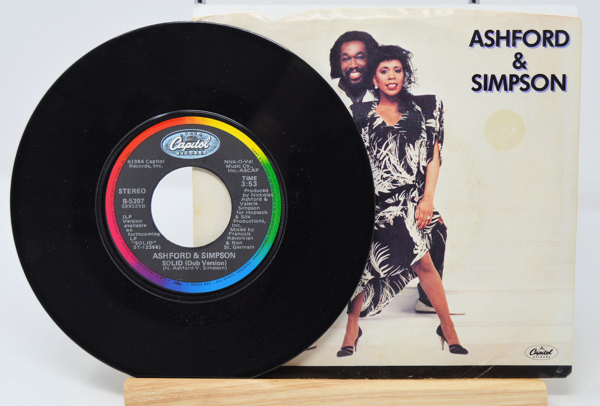 A vinyl record of Ashford & Simpson - Solid with the album cover showing the artists and the title of the album.