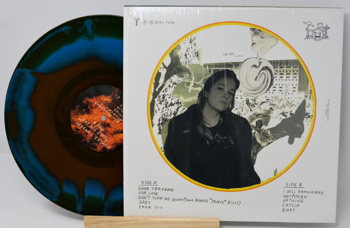 Front and back cover of Ashley Shadow's 'Only The End' limited edition blue and orange swirl vinyl LP