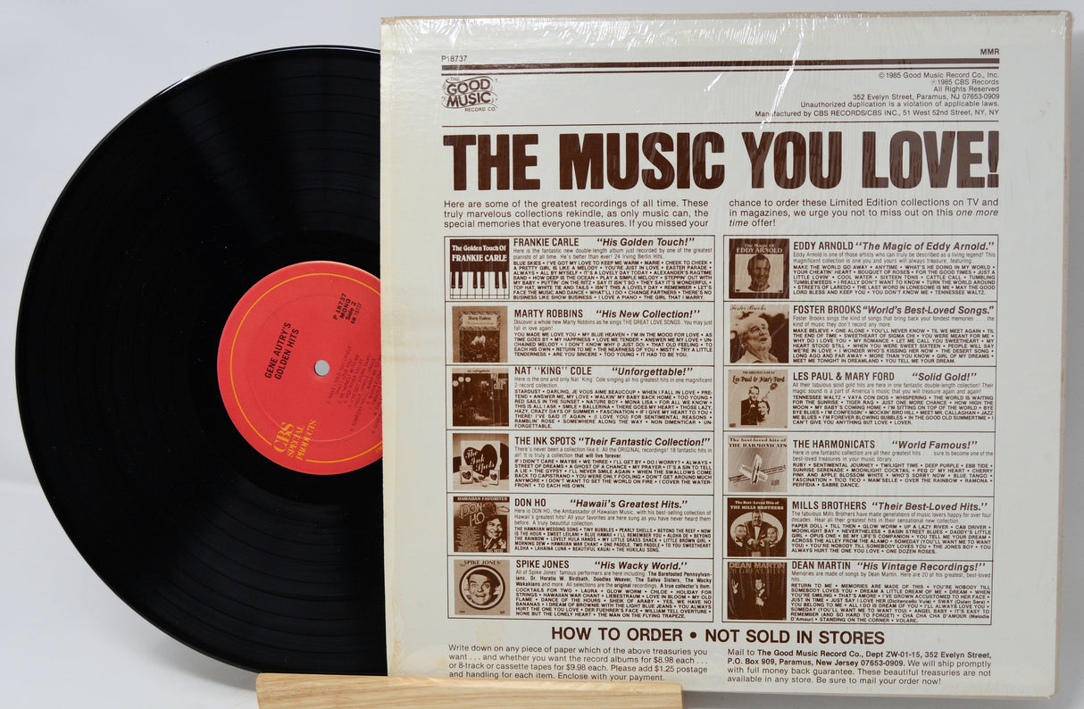 Vinyl record with a red label and its cover displaying text and images.