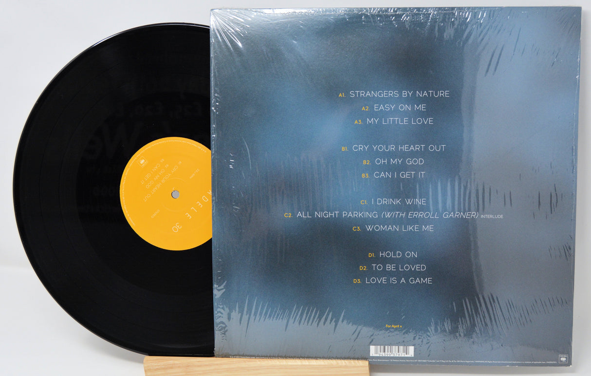Adele 30 vinyl album record and tracklist shown on the back cover