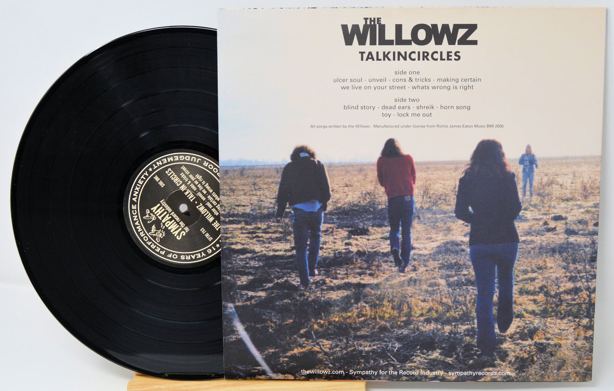 The Willowz Talkin' Circles vinyl record cover back with track listing and band members walking in a field