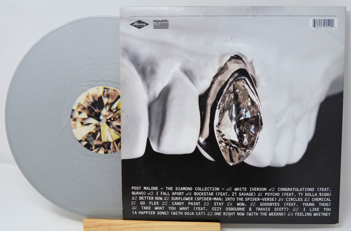 Back cover of Post Malone The Diamond Collection vinyl featuring large diamond grill art and silver vinyl