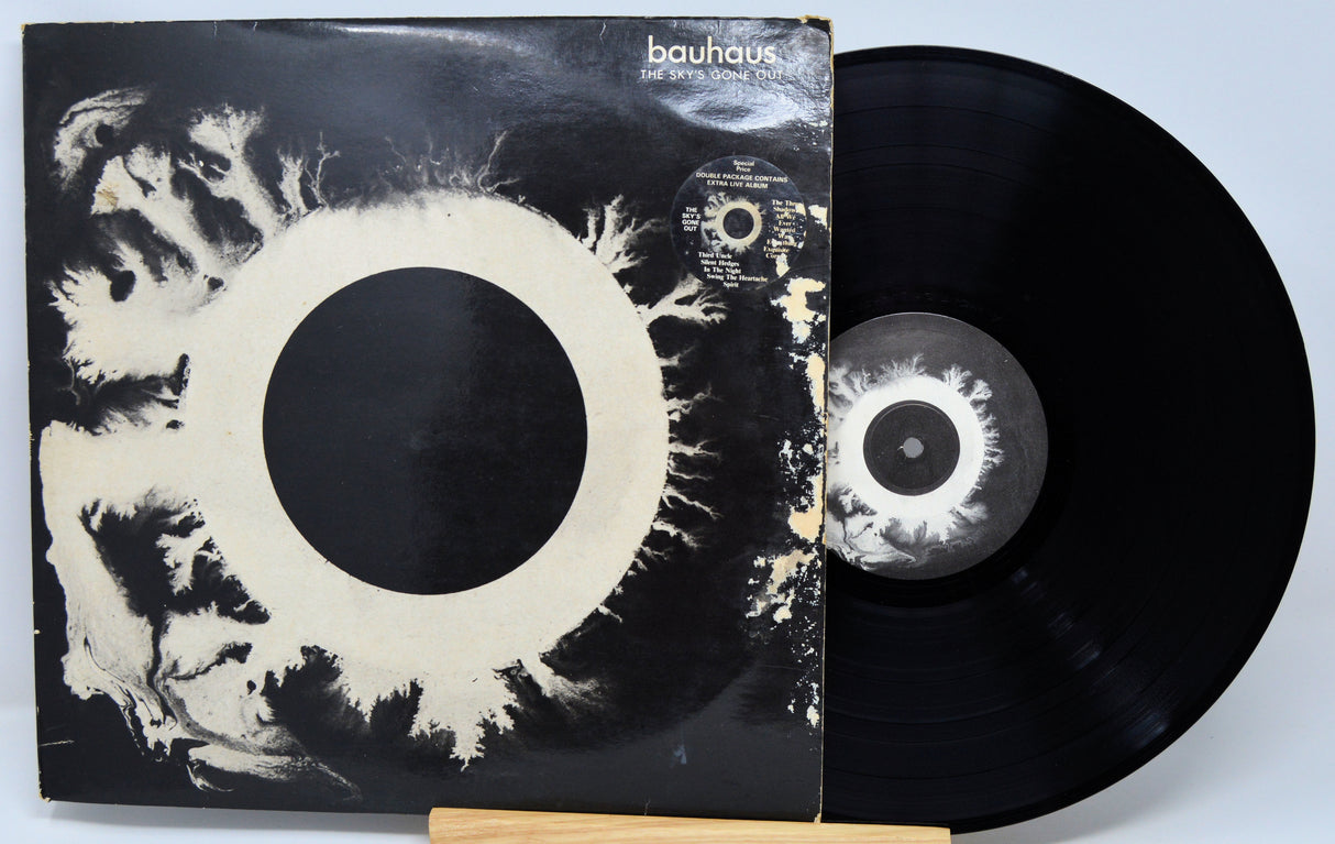 Vinyl record with its cover featuring abstract design and 'bauhaus' branding.
