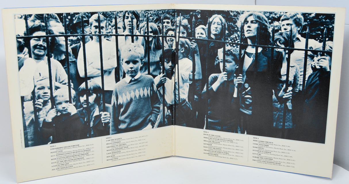 Album cover with black and white photos of people behind bars and text on a white background
