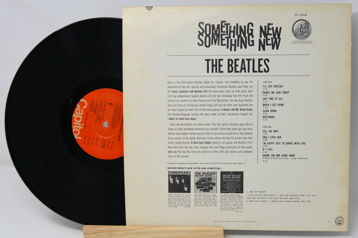 Vinyl record with cover displaying 'Something New' by The Beatles