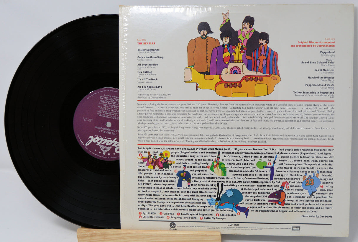 Vinyl record with a colorful cover featuring cartoon characters and text.