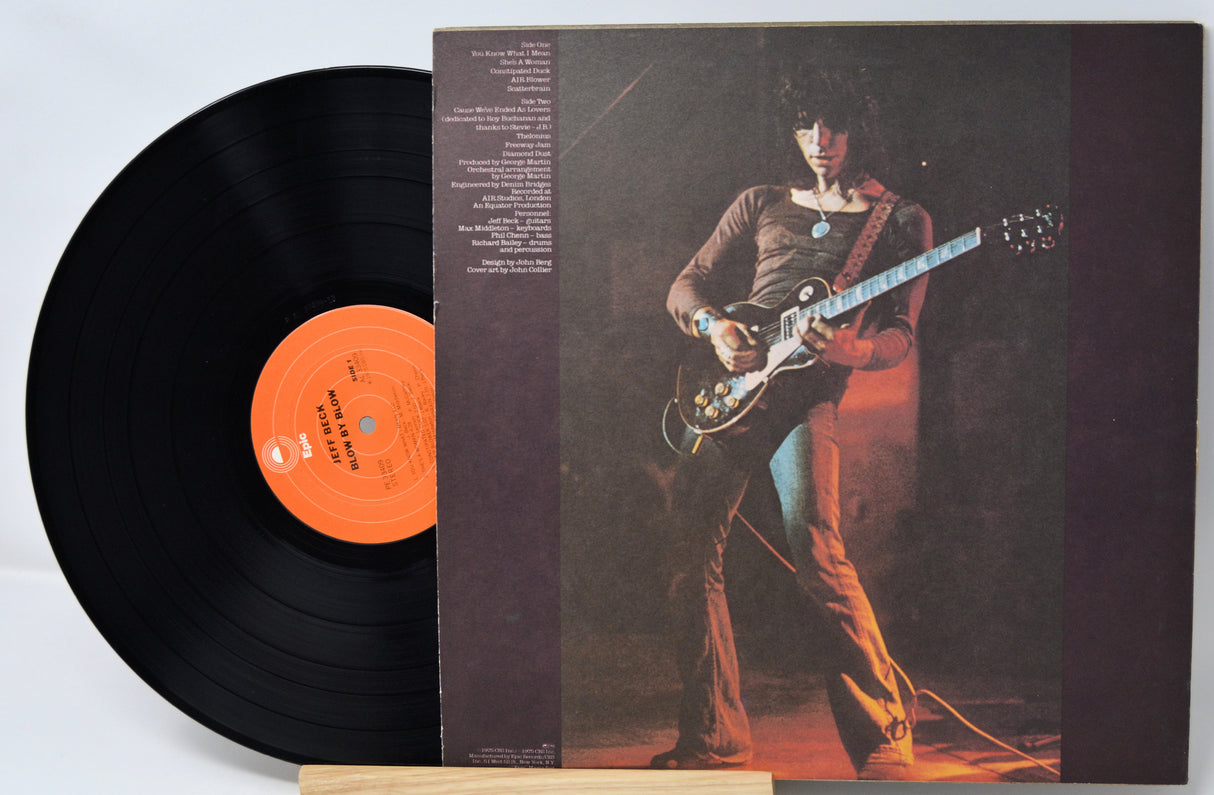 Vinyl record with a guitar player on the cover