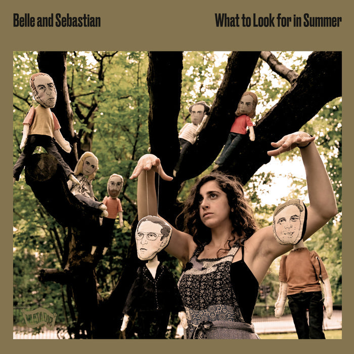 A vinyl record titled 'Belle & Sebastian - What To Look For In Summer' with album cover art featuring a group photo of the band members.