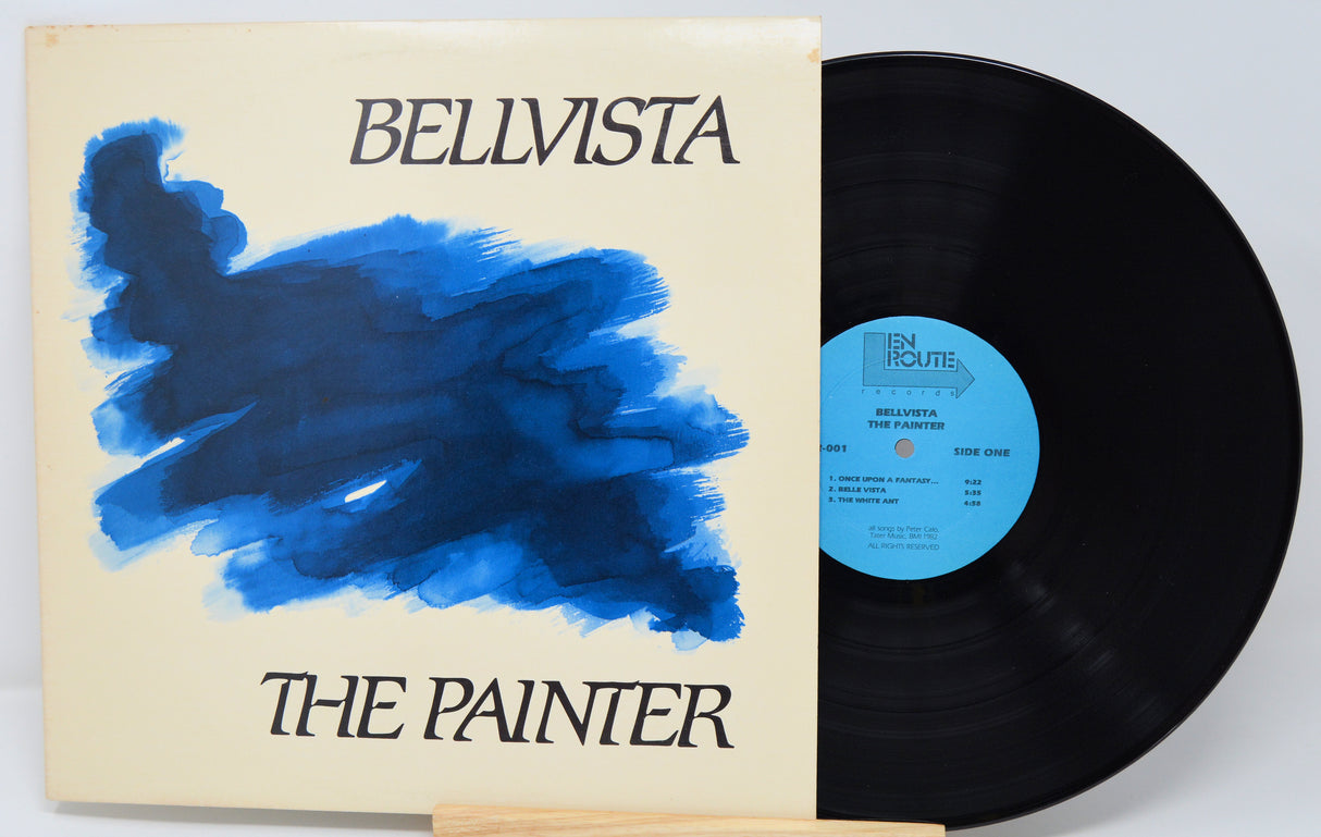 Vinyl record with a blue abstract design on the cover, featuring the text 'Bellvista The Painter'.