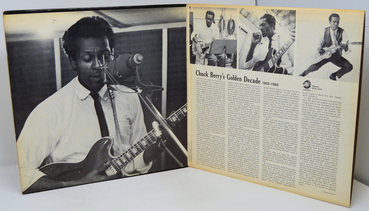 Album cover with black and white photo of a musician playing guitar and text on a white background