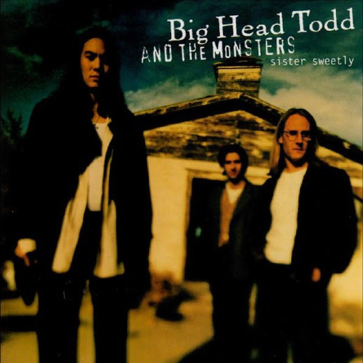 Sister Sweetly album cover featuring Big Head Todd & the Monsters standing in front of a rustic building