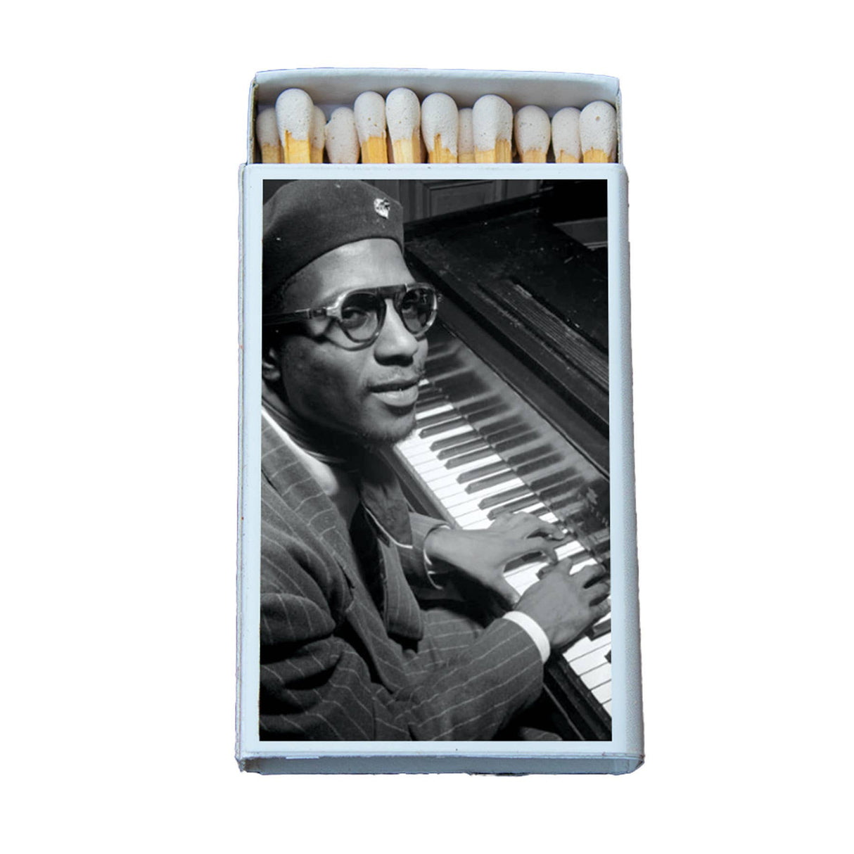 Matchbox featuring a black-and-white photo of a jazz pianist at the piano