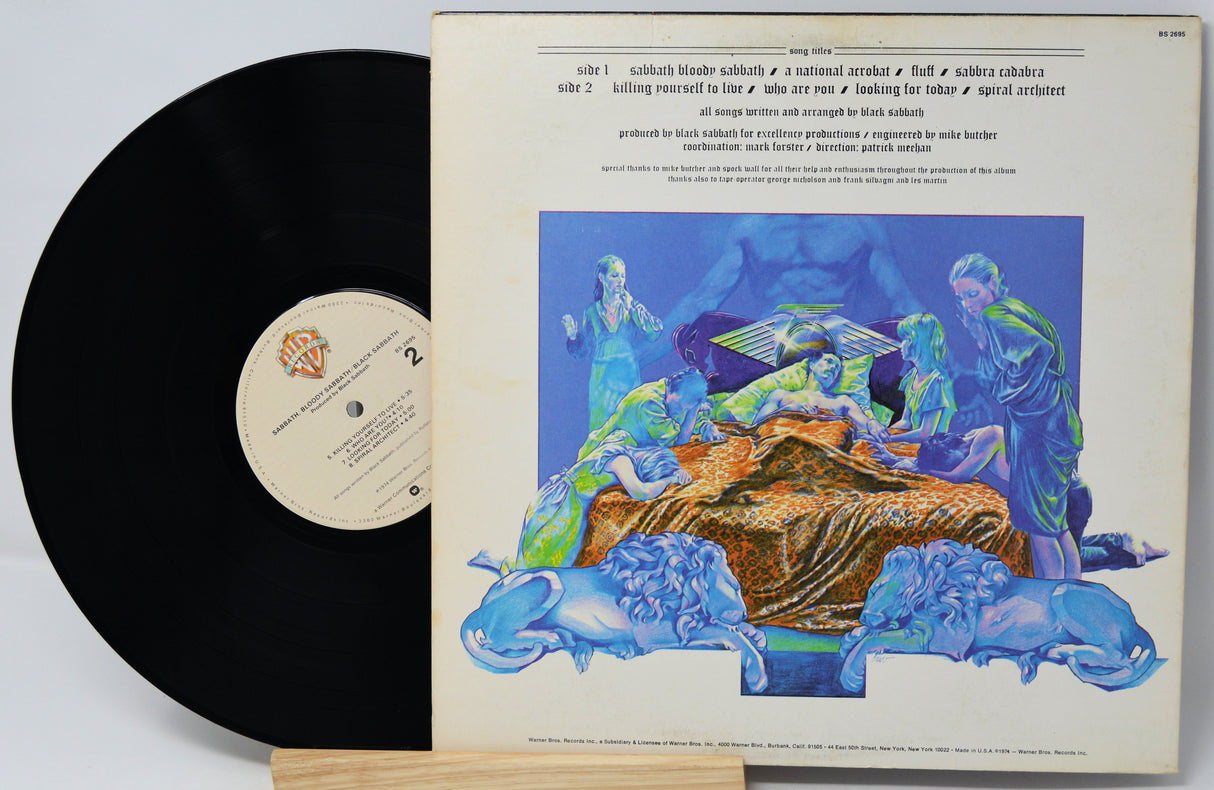 Vinyl record with colorful cover featuring classical music scene