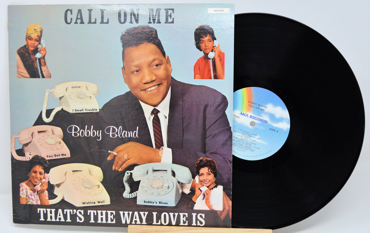 Vinyl record with cover featuring Bobby Bland and telephone imagery on a light blue background