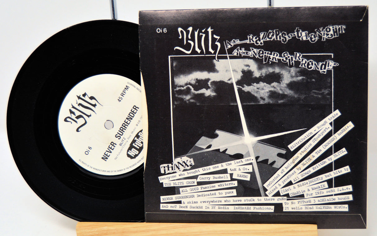 Vinyl record and its cover with 'Blitz' branding on a white background