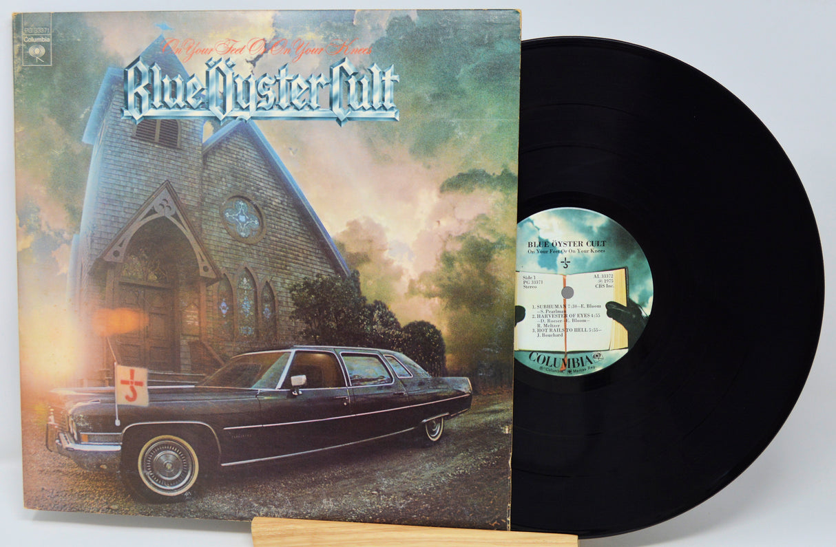 Vinyl record with cover featuring a limousine and church, titled 'Blue Hysteria Cult'.