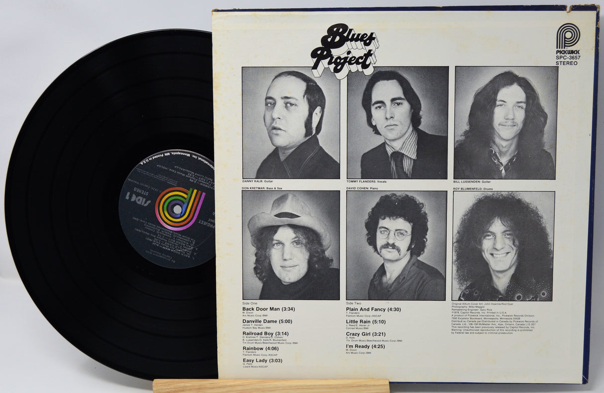 Vinyl record and cover of 'Blues Project' with black and white portraits on the cover.