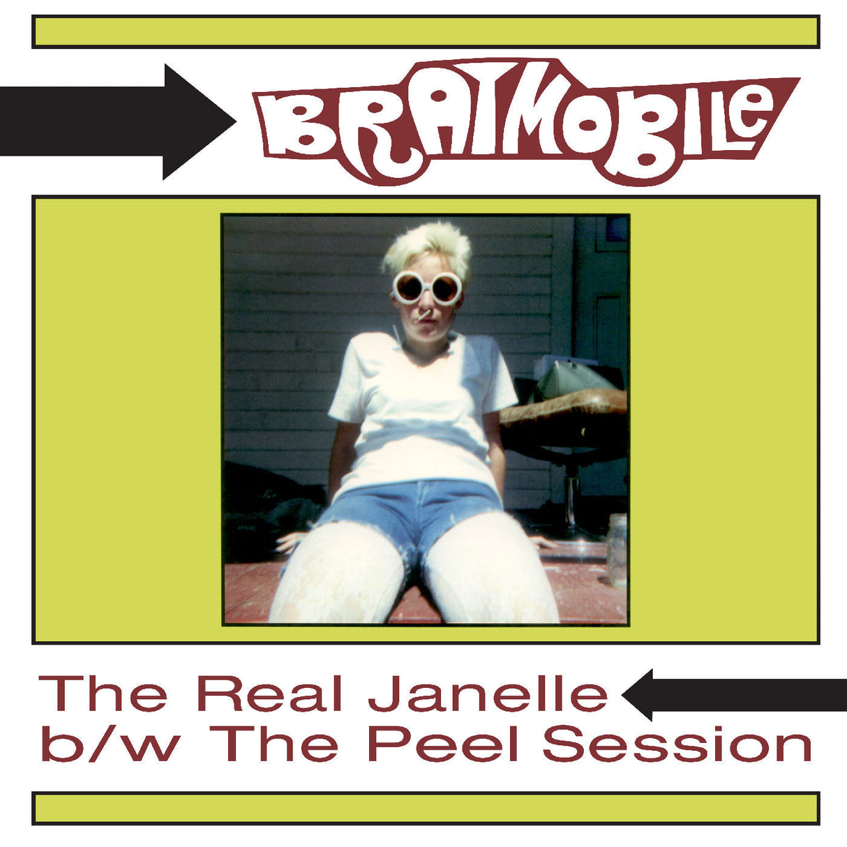 Front cover of Bratmobile The Real Janelle b/w The Peel Session album featuring a woman sitting outdoors