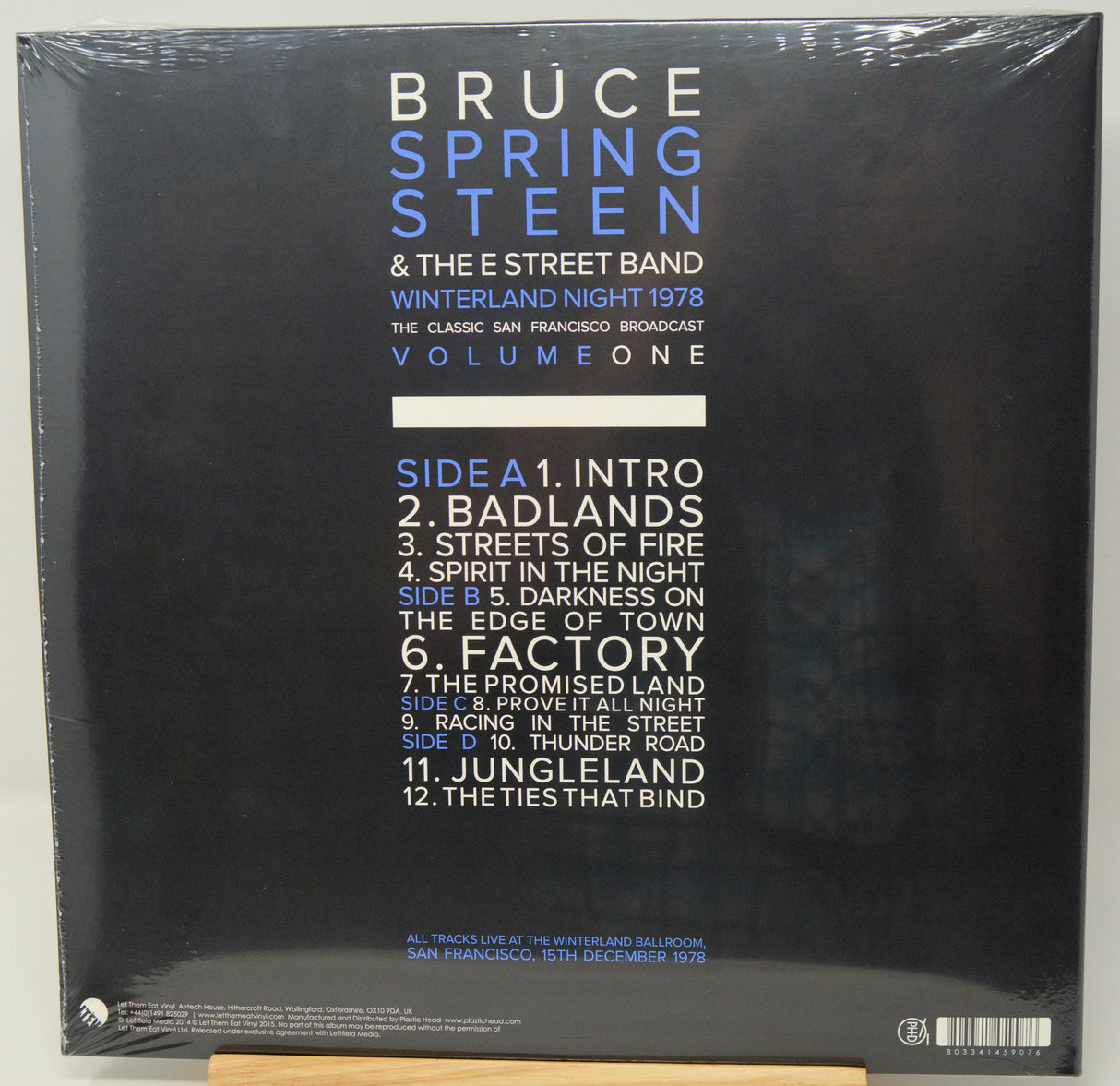 The back cover of Bruce Springsteen & The E Street Band's 'Winter Sand Night 1978' Volume 1 album, sealed in plastic shrink wrap, with a tracklist on a black background.