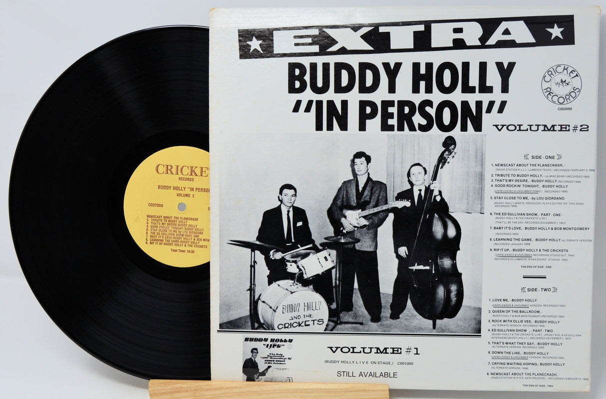 Vinyl record with cover featuring Buddy Holly and The Crickets, labeled 'Extra Buddy Holly In Person Volume 2'.