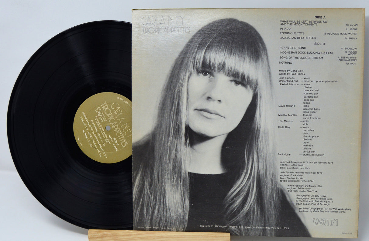 Back cover of 'Tropic Appetites' vinyl showing Carla Bley portrait and album credits