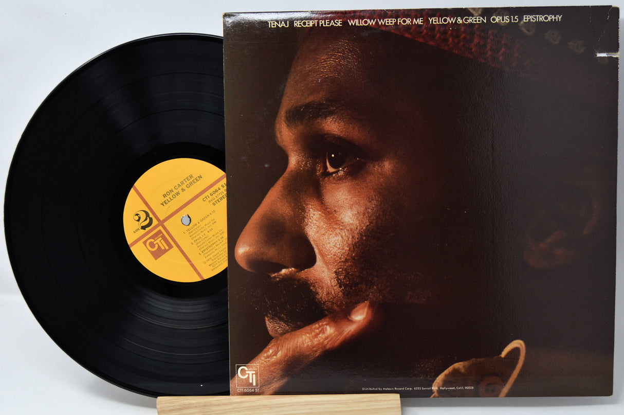 Vinyl record and cover with a close-up of a person's face on the cover