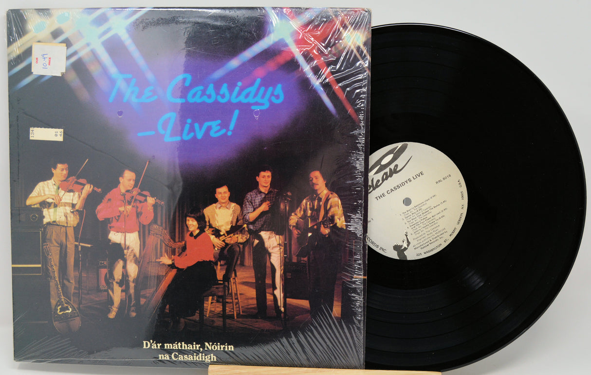 Vinyl record with cover featuring a band and 'The Cassidys Live!' text on a white background