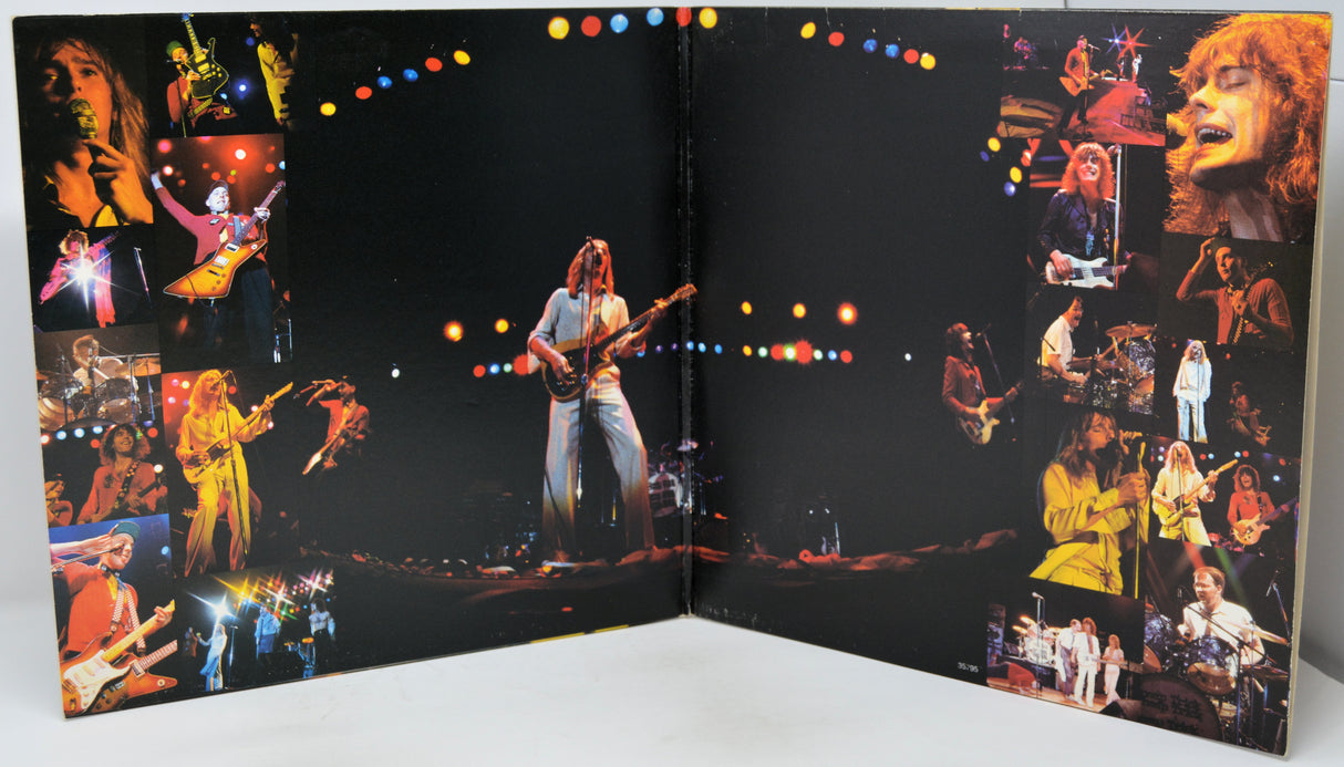 An open book or album cover spread showing a black background filled with colorful concert photographs of a musician performing on stage. The center panel features a guitarist on a brightly lit stage, with smaller collage-style photos of the same performance around the edges.