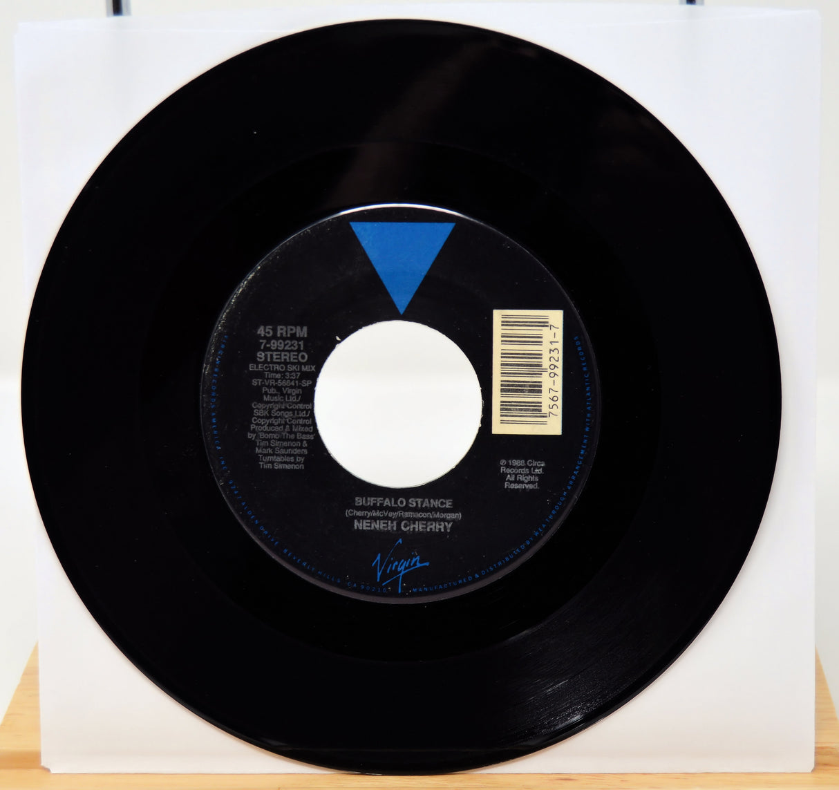 Vinyl record with a white label on a white background