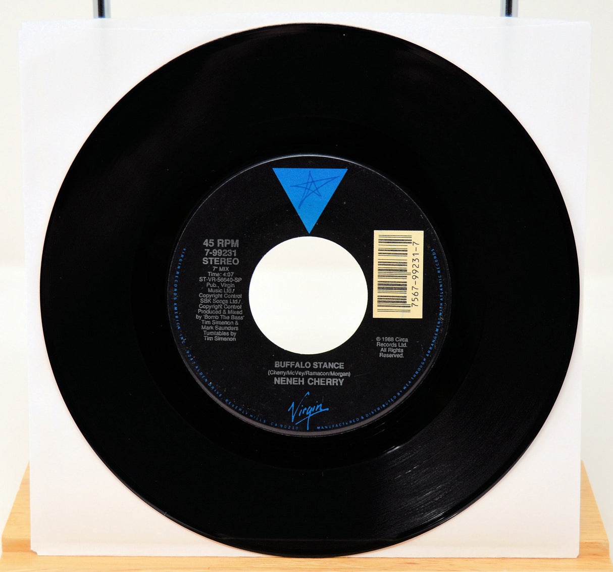 Vinyl record with label on a white background