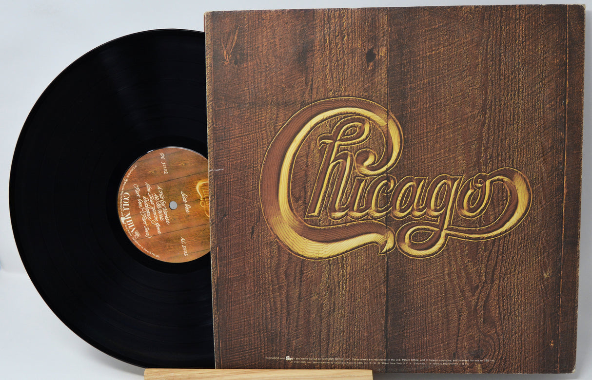 Vinyl record with wooden cover featuring 'Chicago' logo