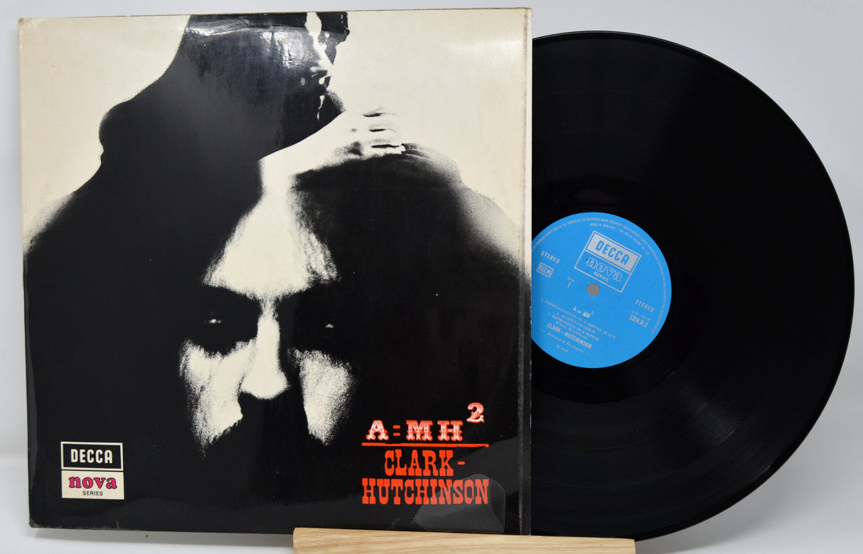 Vinyl record with cover featuring a black and white portrait and 'Becca' branding.