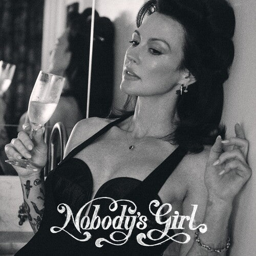 Close-up of Nobody's Girl album cover showing a sophisticated woman with a drink