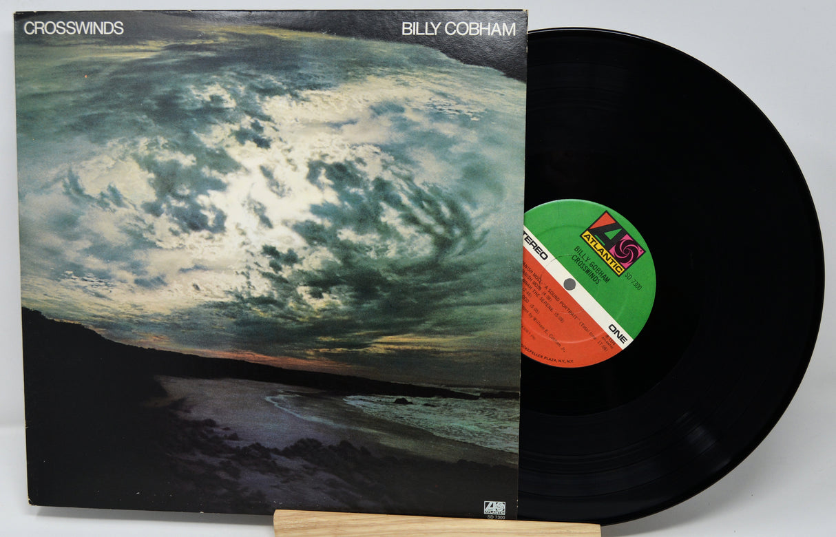 Vinyl record with a cover featuring a landscape and a visible label.