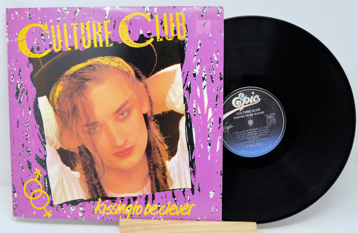 Vinyl record with 'Culture Club' album cover featuring a person with braided hair.