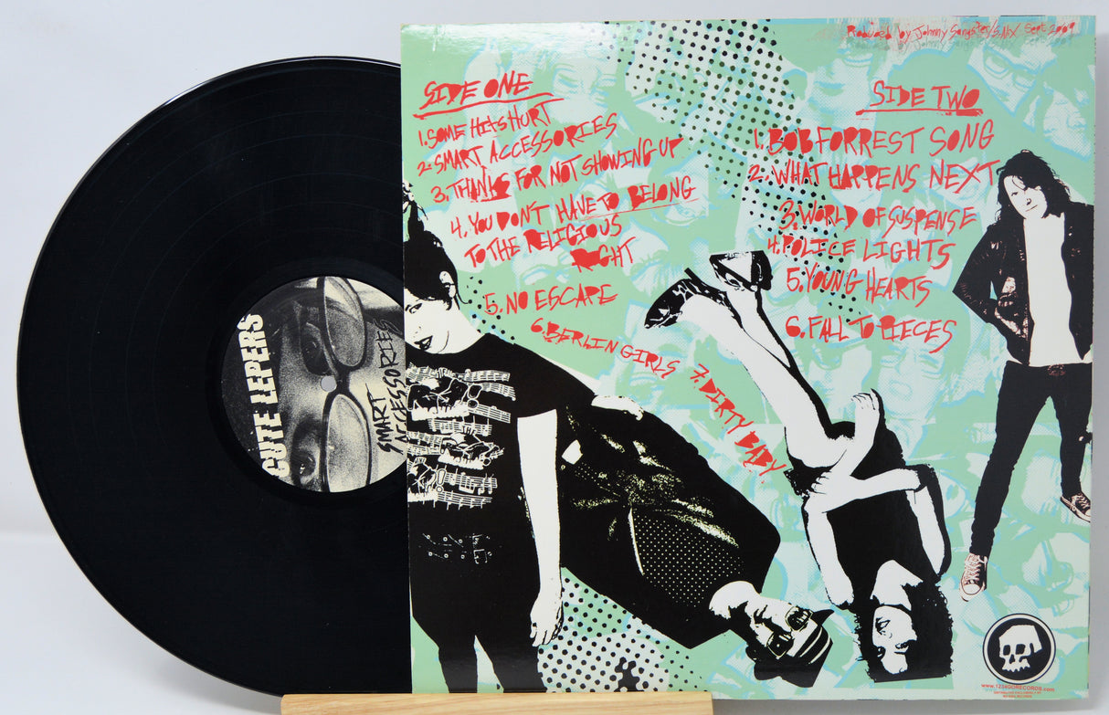 Vinyl record with a colorful cover featuring artistic illustrations and text.