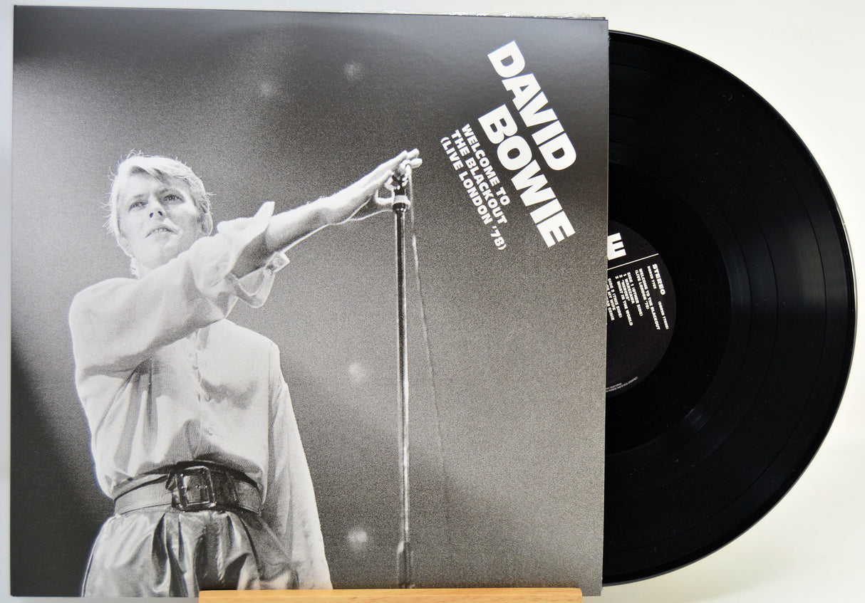 David Bowie 'Live at the Brighton Dome' 12-inch vinyl record LP with its paper sleeve cover, shown on a light background.