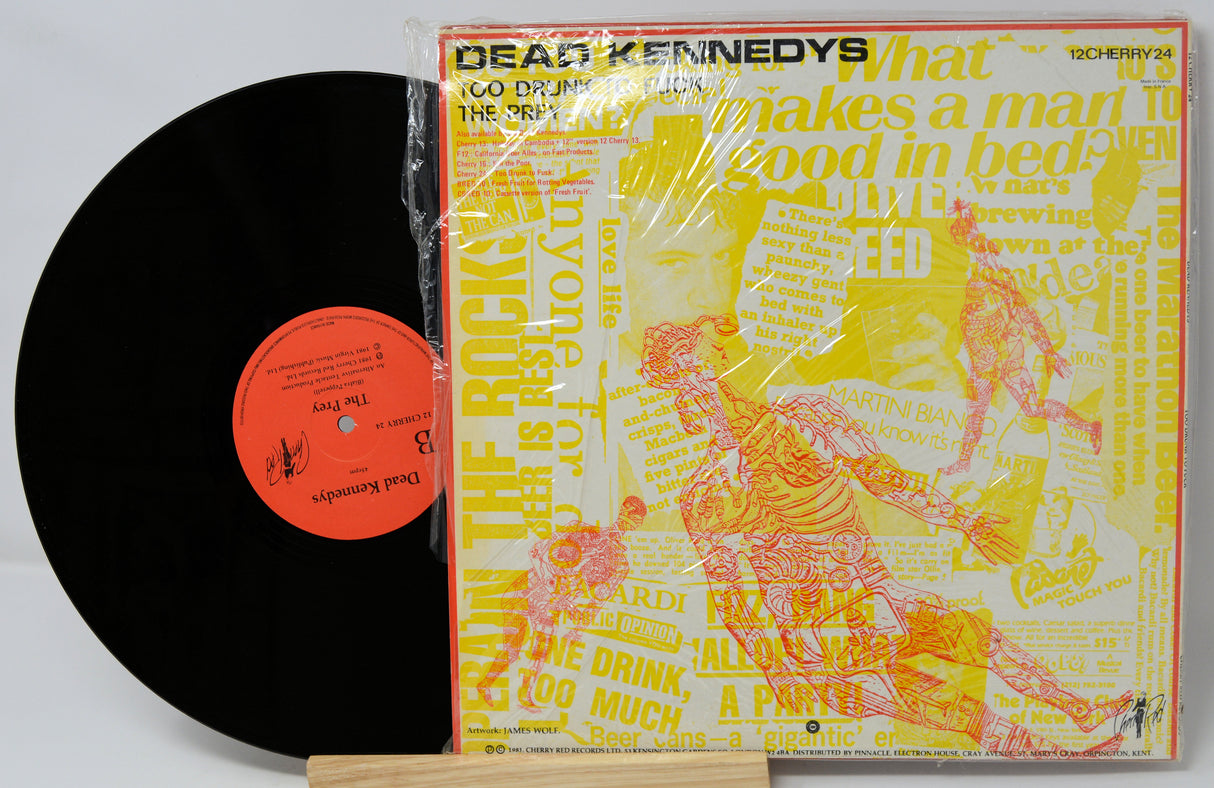 Vinyl record and cover of 'What Makes a Man Good in Bed' by Dead Kennedys on a white background